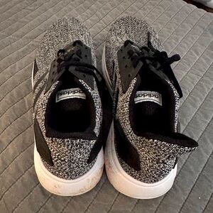 Black and grey adidas men’s running shoes